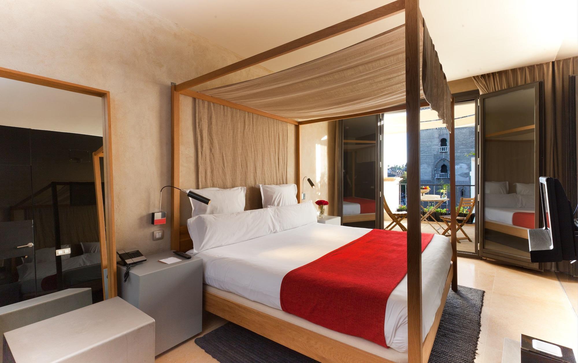 Eme Catedral Mercer Hotel Σεβίλλη Εξωτερικό φωτογραφία A bedroom at the hotel