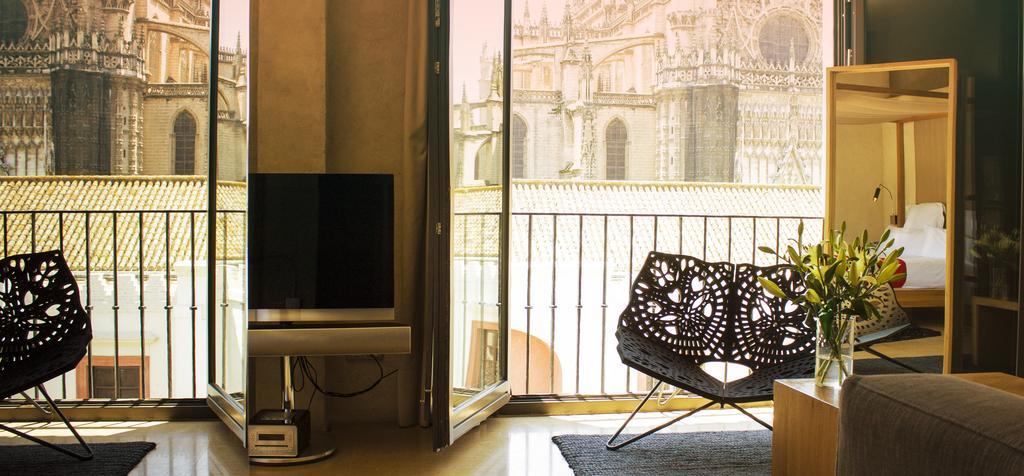 Eme Catedral Mercer Hotel Σεβίλλη Εξωτερικό φωτογραφία The interior of a typical apartment