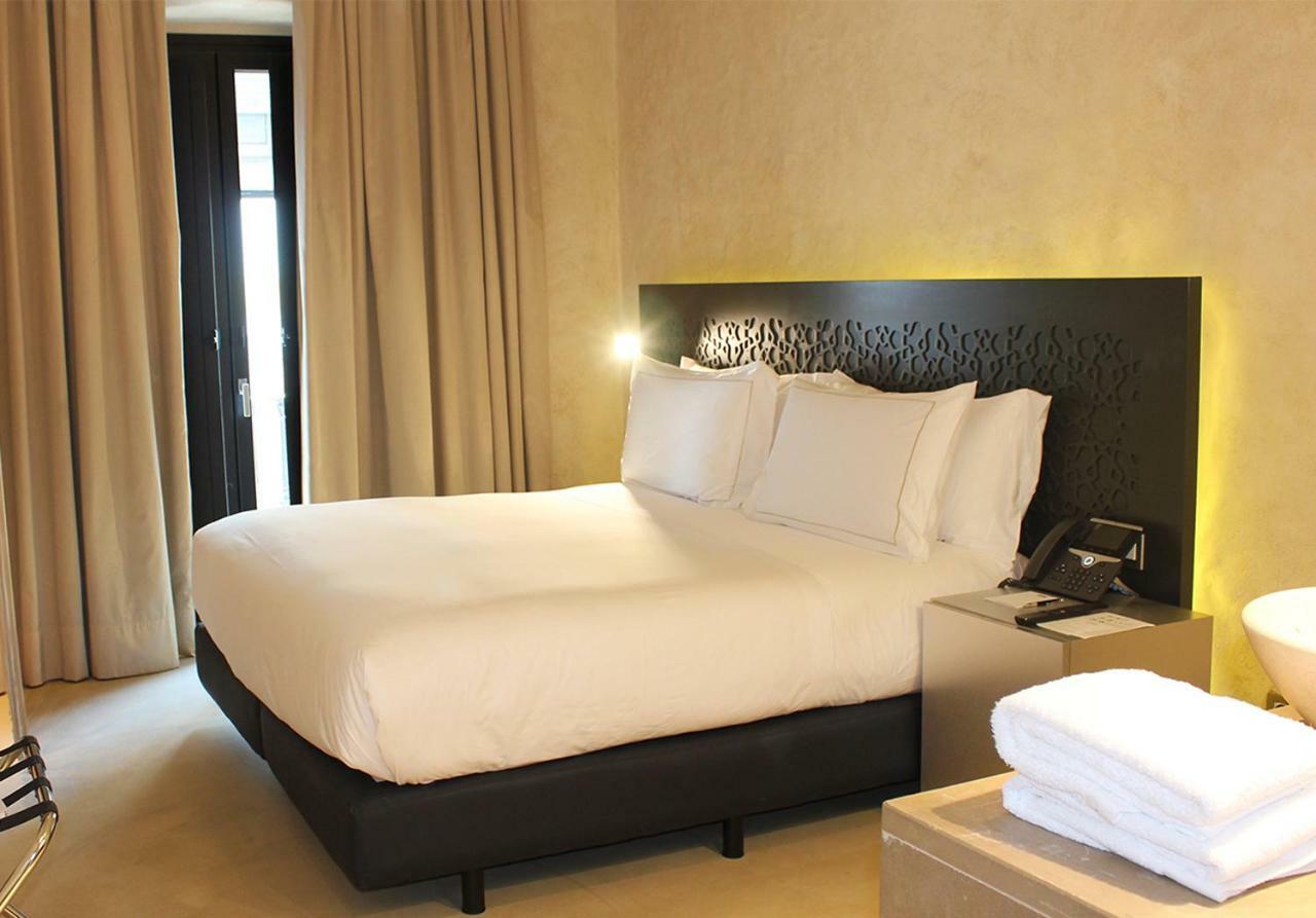 Eme Catedral Mercer Hotel Σεβίλλη Εξωτερικό φωτογραφία A bedroom at the hotel
