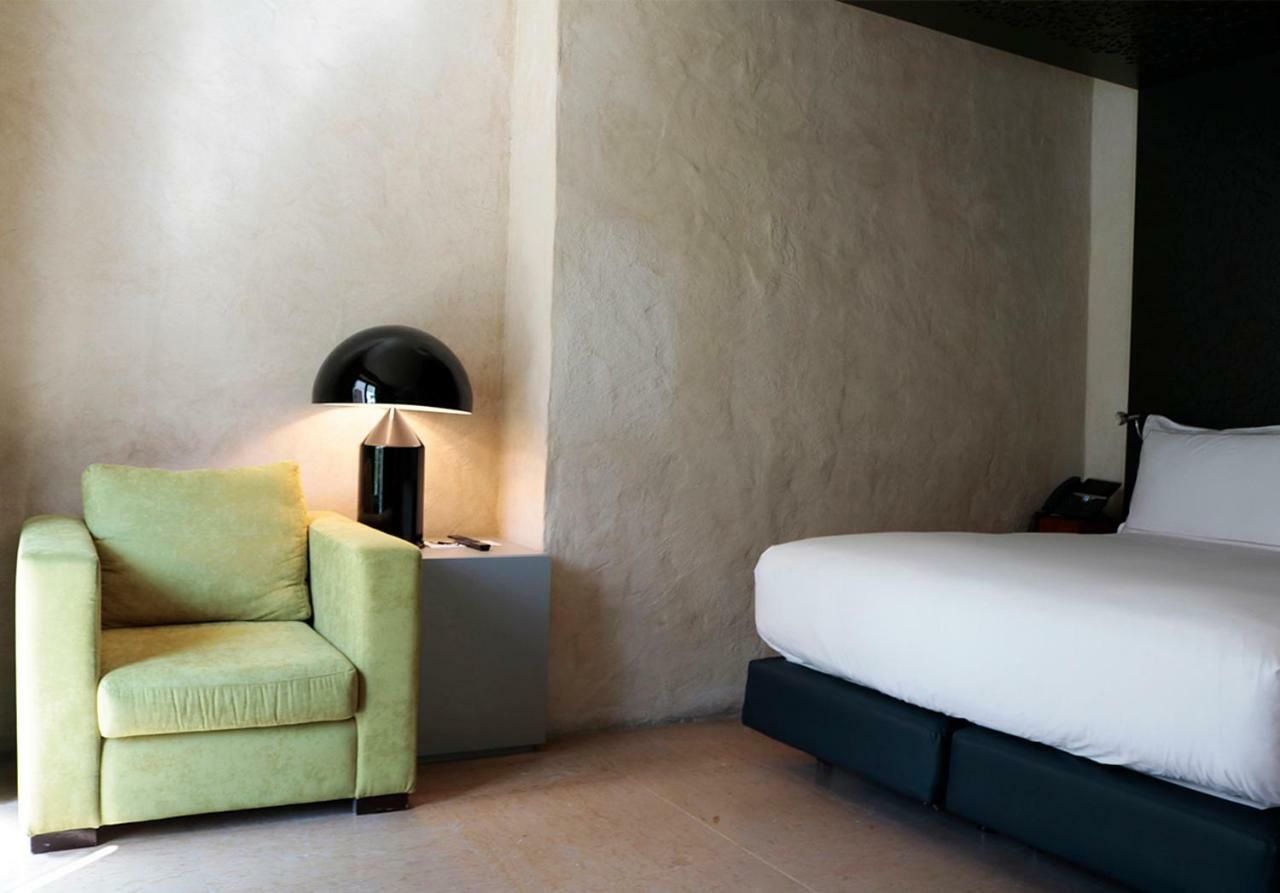 Eme Catedral Mercer Hotel Σεβίλλη Εξωτερικό φωτογραφία A room at the hotel