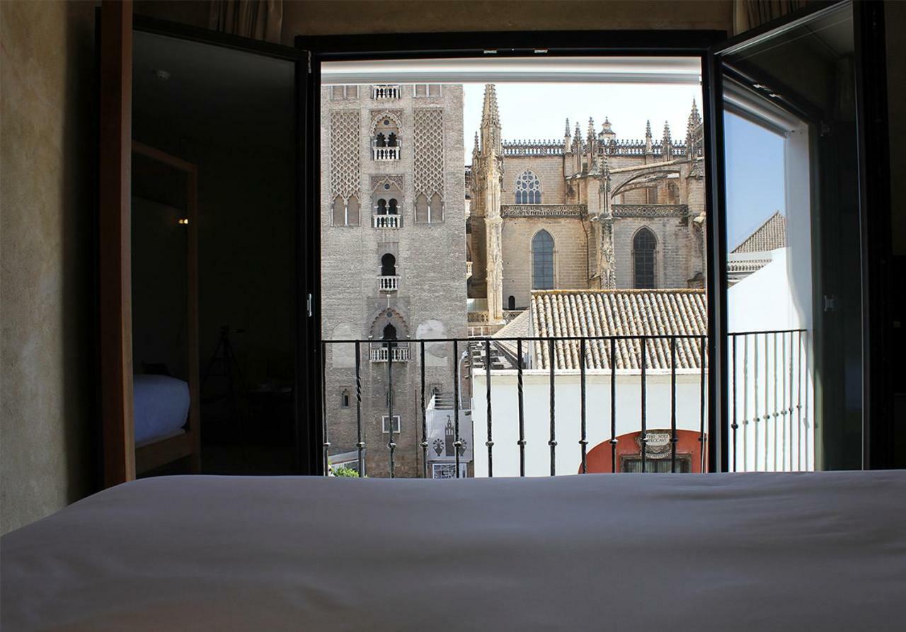 Eme Catedral Mercer Hotel Σεβίλλη Εξωτερικό φωτογραφία View of the Cathedral of Seville from the hotel